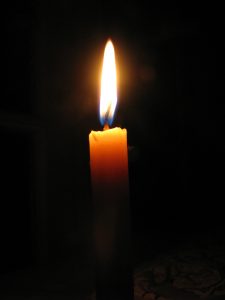 Burning Taper Candle